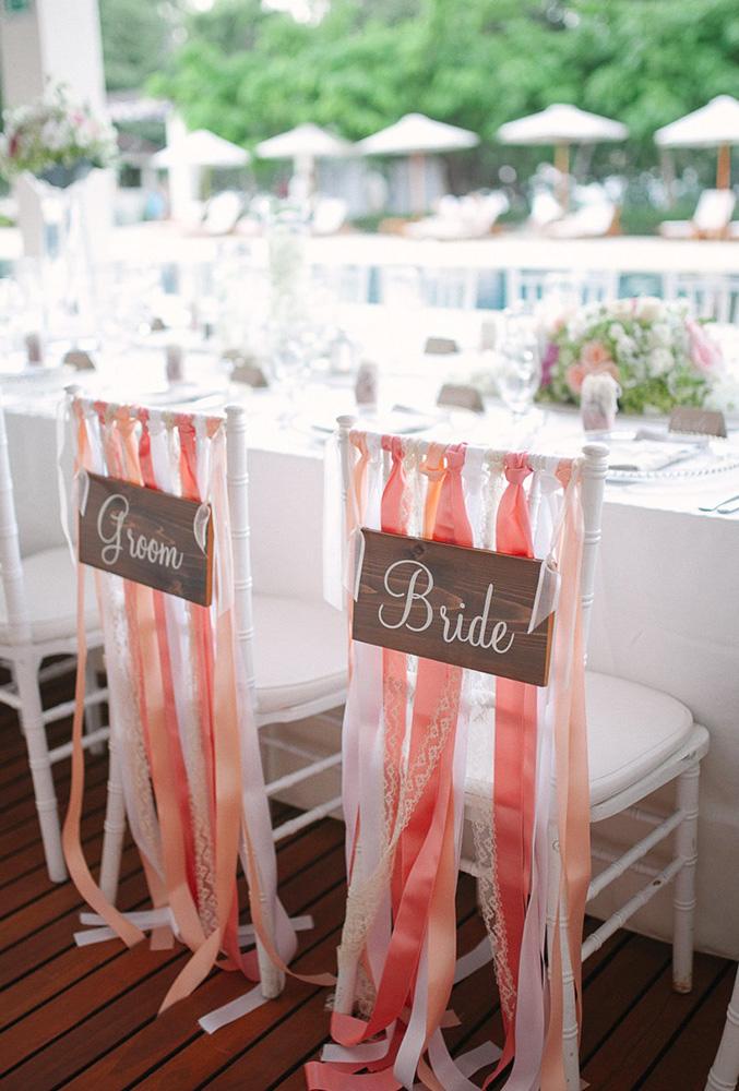 wedding chair decorations coral ribbon Margaux Gamble
