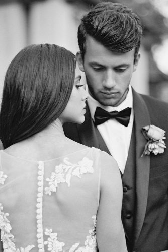 besame wedding styled shoot bride in dress with lace back groom with boutonniere carrie king photographer
