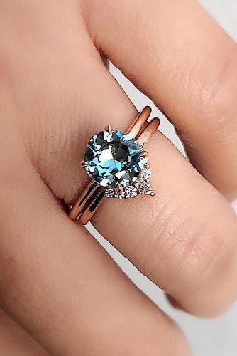engagement ring round cut gemstone solitaire rose gold unique band