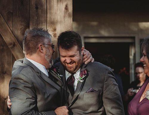father of the groom speech groom and his father happy
