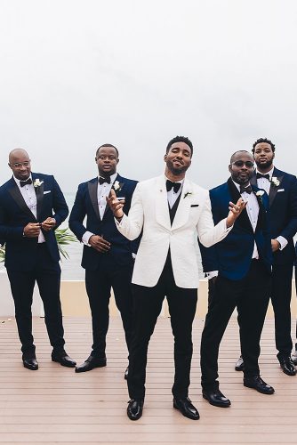 real wedding cindy glen black groom and his best mans in dark blue suits stanlo photography