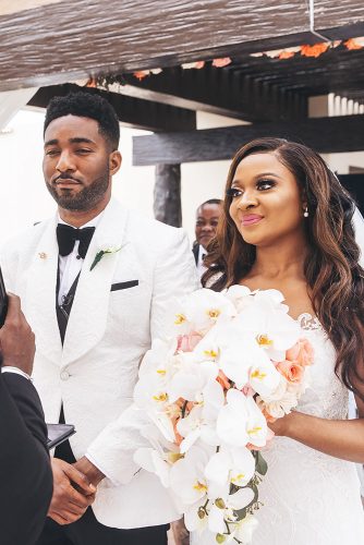 real wedding cindy glen ceremony groom and brode on wedding althar stanlo photography