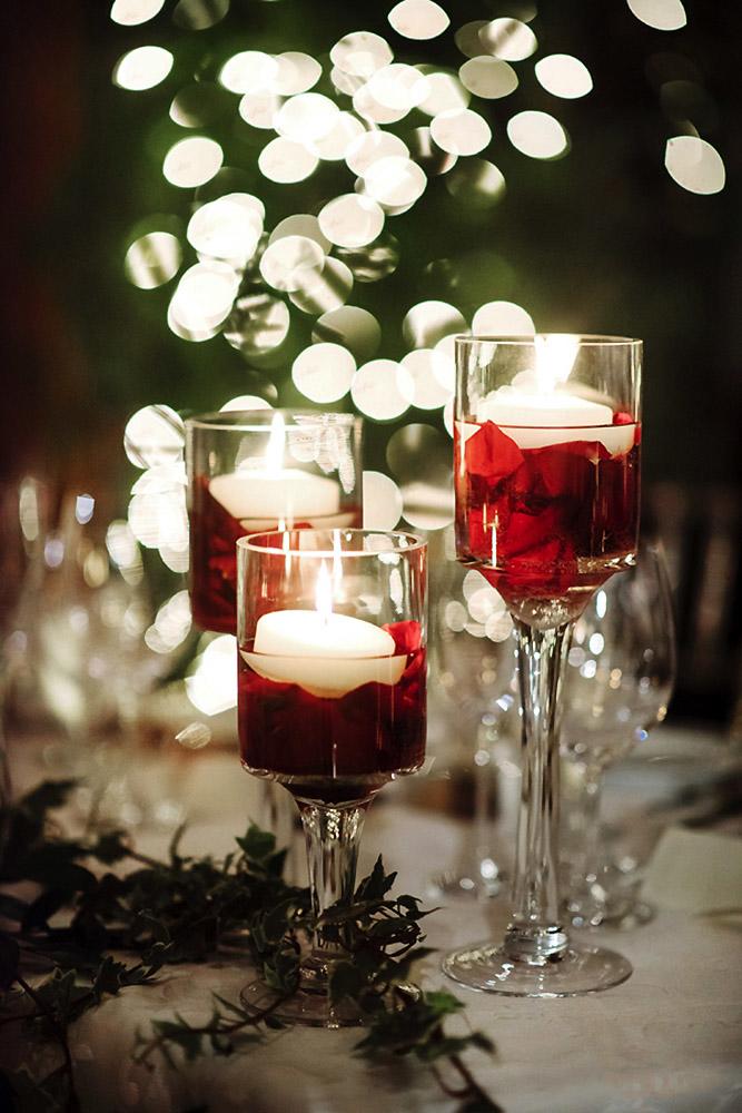 christmas wedding candle centerpiece in water with red decor hong photography