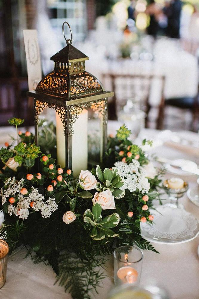 christmas wedding candle lantern with white roses and pine branches pat robinson photography