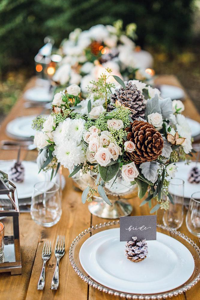 christmas wedding elegant table with pine cones and flower centerpieces deisy photography