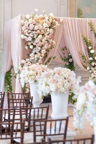 dusty rose wedding elegant indoor ceremony with flower aisle decor lamemoir