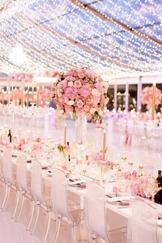 dusty rose wedding reception under lighting tent with tall roses centerpiece genevieve_fundaro