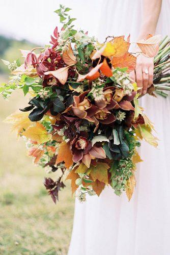 mustard wedding autumn bridal bouquet with orchids greenery and gold leaves danfordphotography