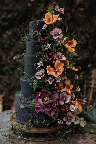 mustard wedding moody tall black cake with flowers cody james barry photography