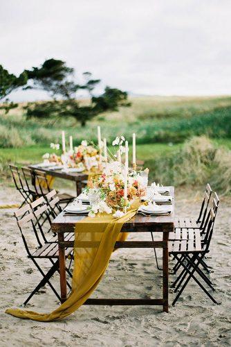 mustard wedding rustic otdoor tables with airy tablerunners donny zavala photography