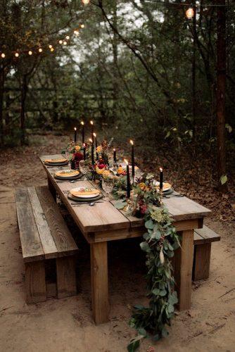 mustard wedding rustic simple wooden table with greenery tablerunner black candles century tree productions