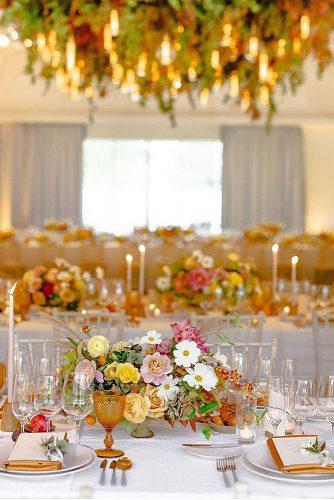 mustard wedding tablen cheerful floers and bright glasses rebeccayale