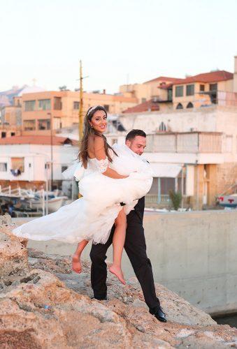 real wedding batroun lebanon bride in grooms arms studio georges youssef