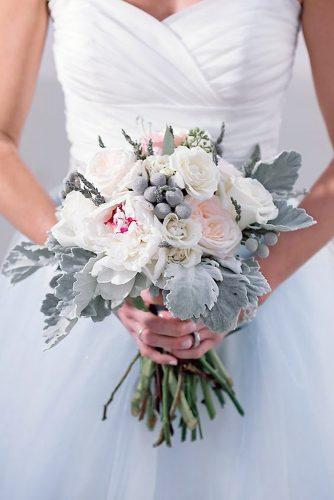 wedding colors 2019 grey leaves and white blush roses in bridal bouquet jamie reinhart photography