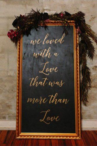 wedding decor 2019 black gold sign with red flowers jessica cooper photography