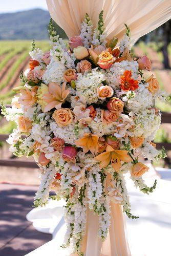 wedding decor 2019 orange roses lilies white flowers decorate altar timhalberg