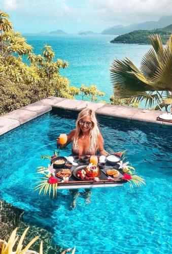 best honeymoon destinations breakfast in pool girl miss.everywhere