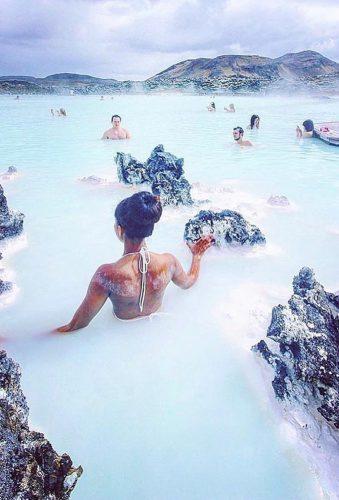 best honeymoon destinations girl in blue water bluelagoon_iceland