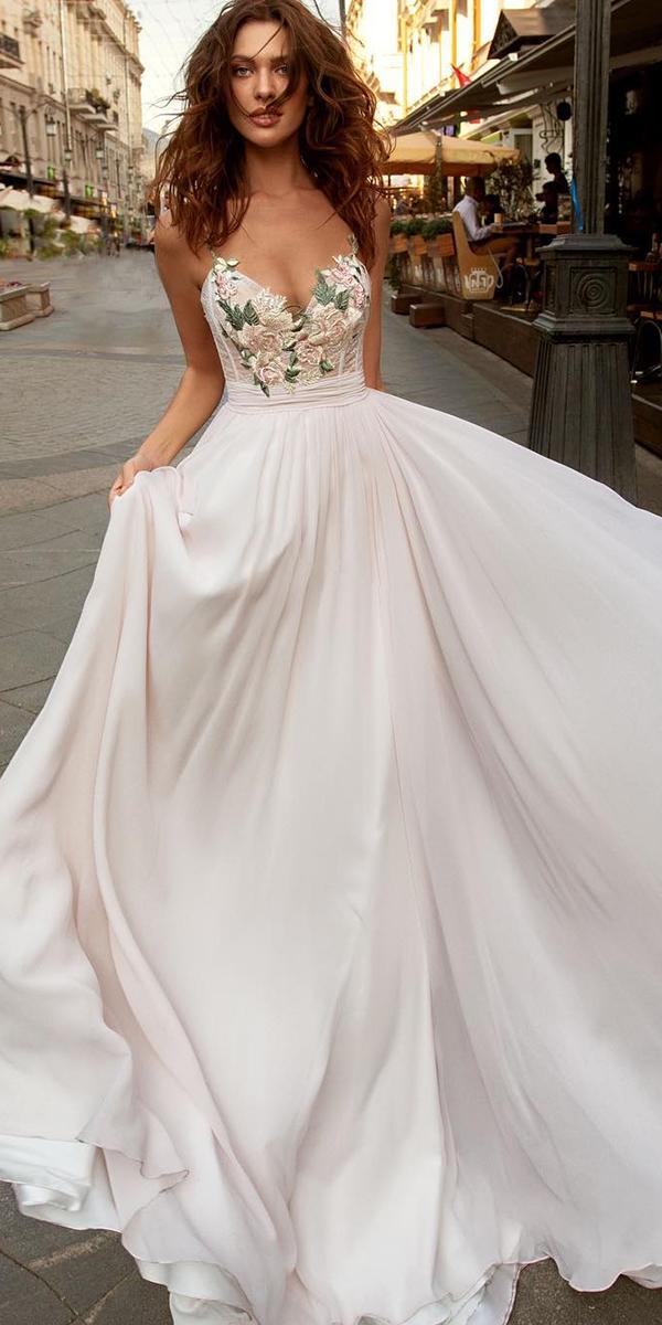 white wedding dress with colored flowers