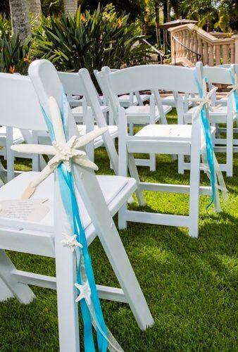 nautical wedding decor ideas starfish in chair decor SeashellCollection