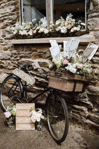 spring wedding decor vintage bicycle with flowers and bridal signs nickwphotography