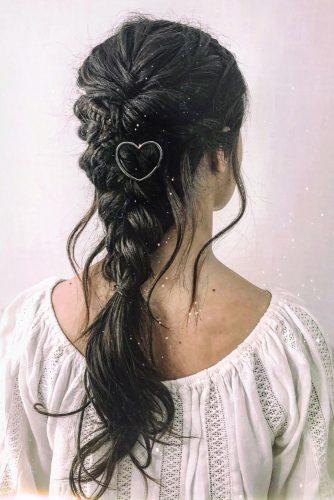 valentines day hairstyles braid down on dark haie with swept and curls metallic heart pin cruzmakeup
