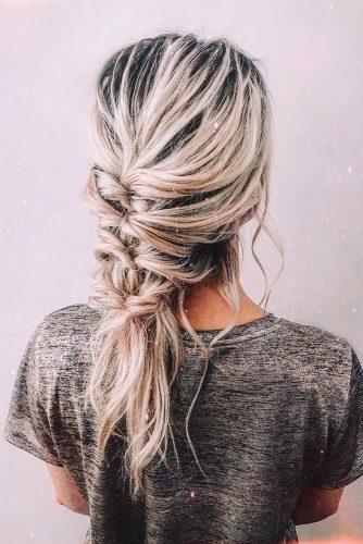 valentines day hairstyles messy braid with loose curls on medium blonde hair cruzmakeup