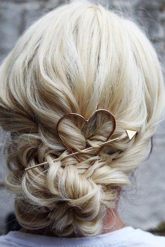 valentines day hairstyles simple low bun with heart and arrow gold metallic hairpin theupdogirl
