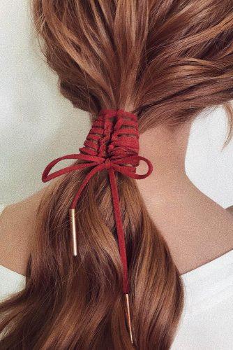 valentines day hairstyles soft wavy ponytail with red rope belaya_lyudmila