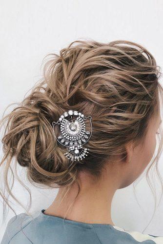 valentines day hairstyles wavy updo with loose curls and ethnic pin belaya_lyudmila