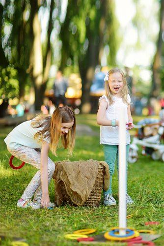 wedding games for kids kids play ring toss at the yard
