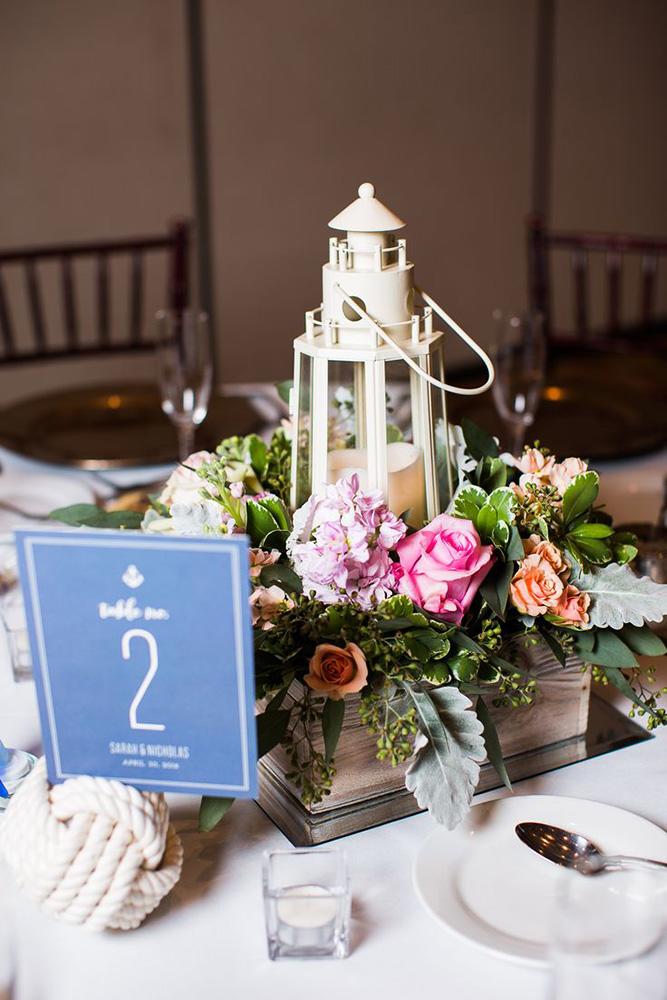 nautical wedding centerpiece in wooden crate lighthouse with bright flowers leigh skaggs photography