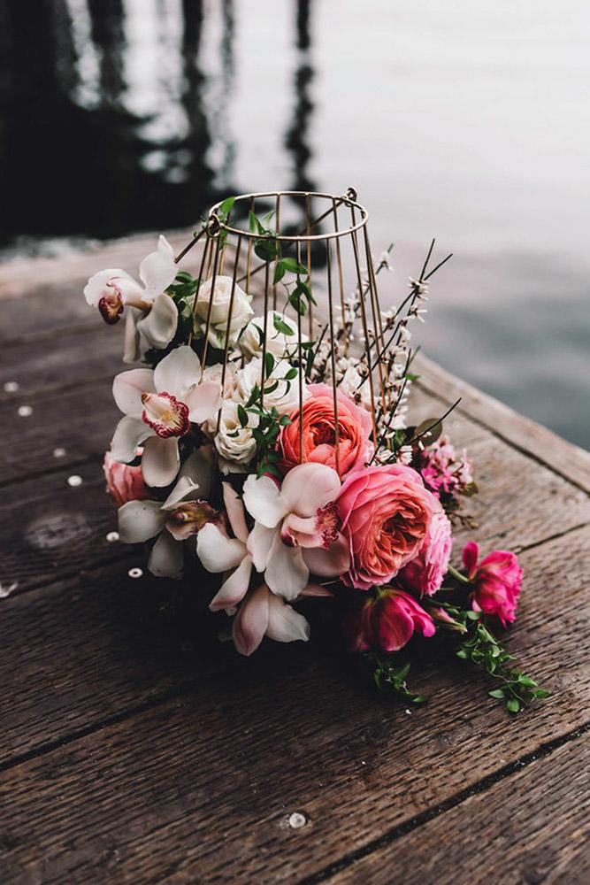 nautical wedding tropical bouquet flowers in a net golden bag michelle roller