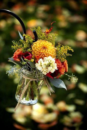 park wedding orange flower in jar Melanie Duerkopp-Johnson Photography