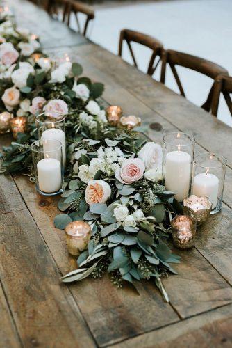 sage green wedding tablerunner with candles and greenery pink and peach roses mark trela photography