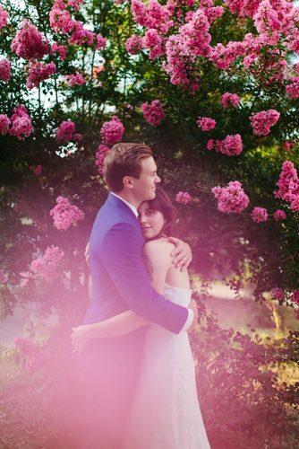 wedding photographers couple in flowers olivia rae