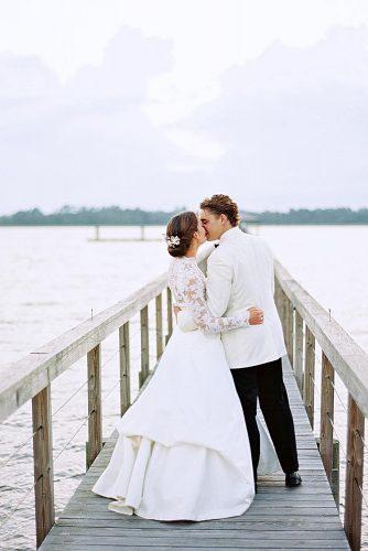 wedding photographers cute newlyweds near lake imryanray