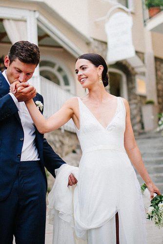 wedding photographers groom kissing brides hand beautiful allanzepedaphoto
