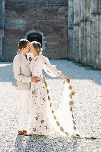 wedding photographers groom kissing the bride kylejohnphoto