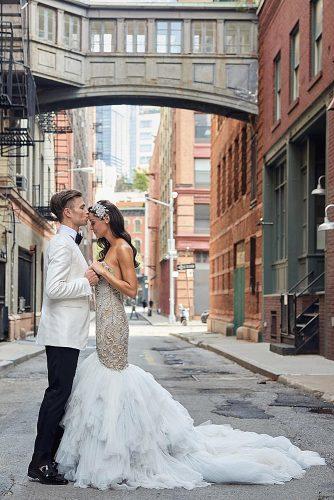 wedding photographers stylish bride and groom at the street christianothstudio