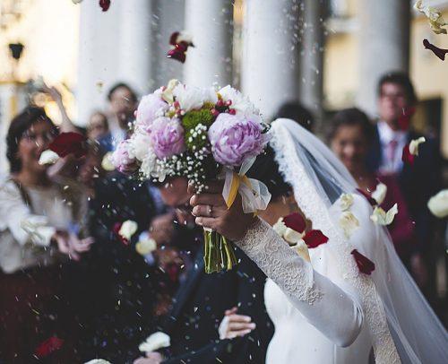 how much does a wedding photographer cost newlyweds at their wedding
