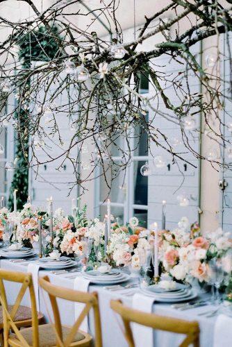 modern wedding decor ideas monochrome blue grey reception flower table runner with hanging branches and candles mat.kb