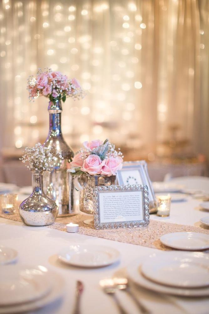 silver wedding decor ideas centerpieces in silver vases bottles amy & jordan photography