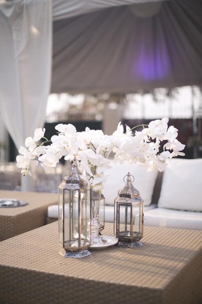 silver wedding decor ideas eclectic lanterns and white orchids melissa jill photography