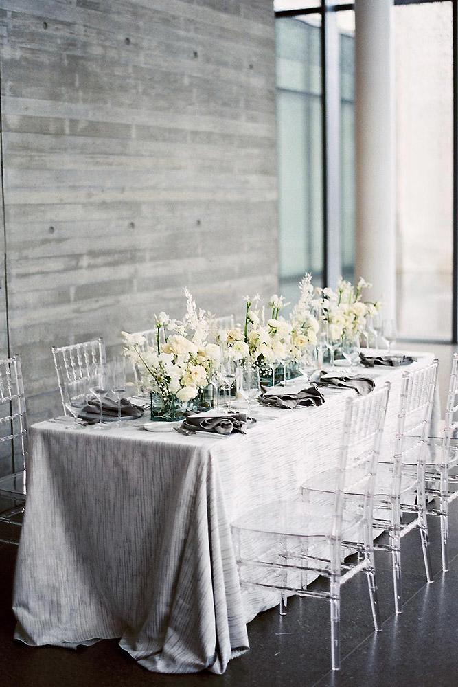 silver wedding decor ideas monochrome reception long table with white flowers jennapowersphoto