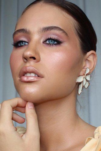 simple wedding makep on blue eyes pink eyeshadows and soft black eyeliner makeupby_andri