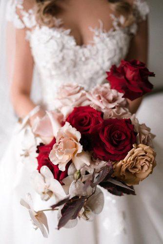 summer wedding trends bridal bouquet with red anf mustard roses and orchids siempreweddings