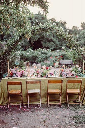 summer wedding trends outdoor table long with greenery tablecloth and natural bright flowers jonachristinaphoto
