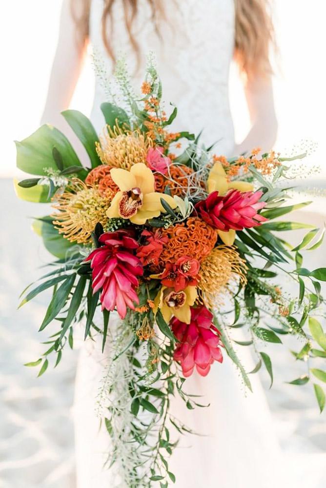 tropical wedding bouquets color cascade bouquet Sandra Huetzen Photograhpy