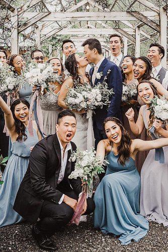 wedding photo checklist informal shot bride and groom with guests